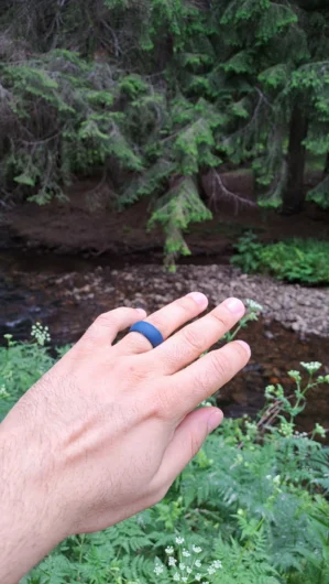 Close-up of the Adventure Blue Silicone Men’s Ring, showcasing its bold blue color and durable design.