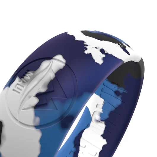 A frosty camouflage-patterned silicone ring with M mountain logo for participating in aquatic activities and riding waves.