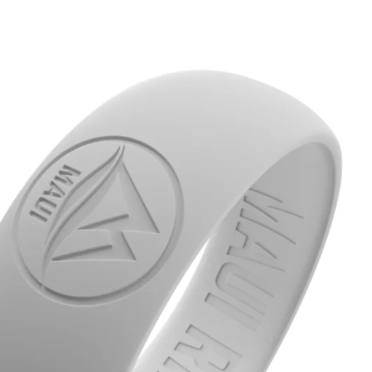 Detailed view of white grey silicone ring with M Maui Rings mountain logo.