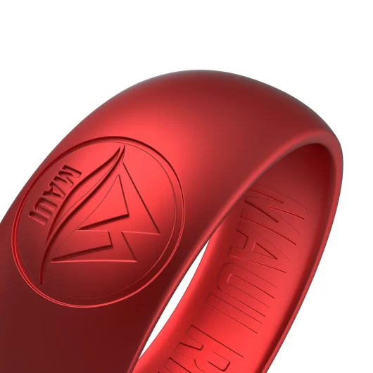 Red ruby color metal silicone ring for men with an M logo design with waves to show off at chic events.